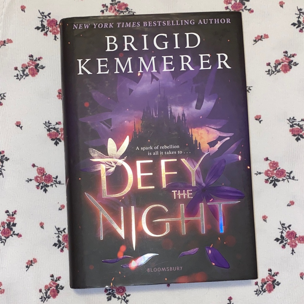 Defy the Night Hardcover Book